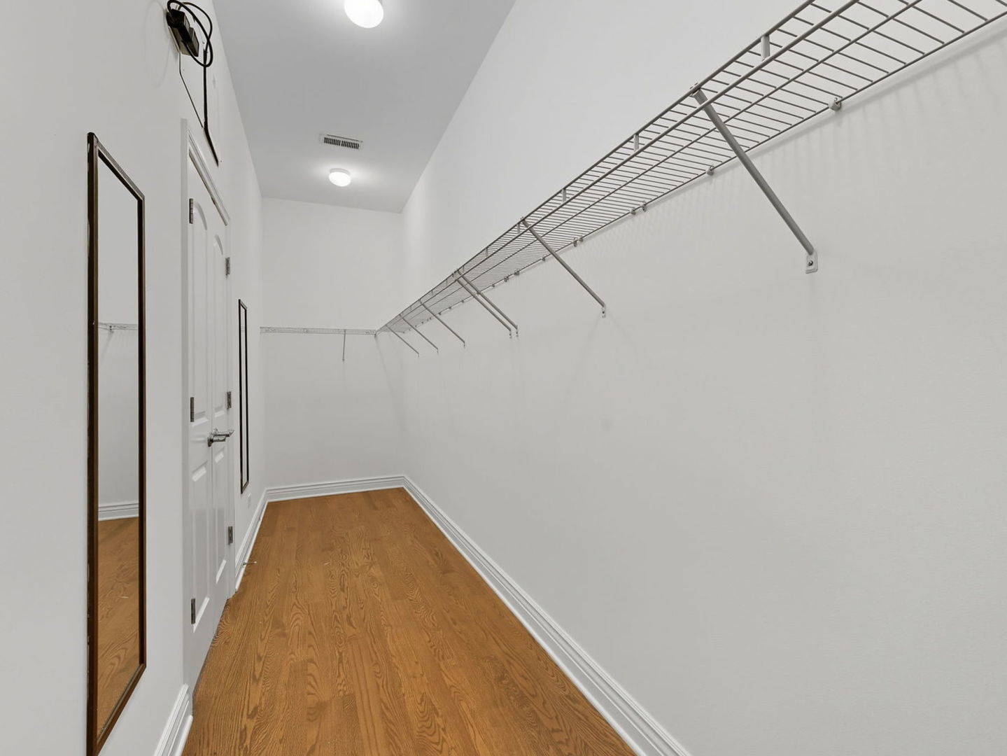 1248 West Jackson Boulevard, Unit 4W Chicago, IL 60607 - Photo 18 of 24 a view of a hallway with staircase