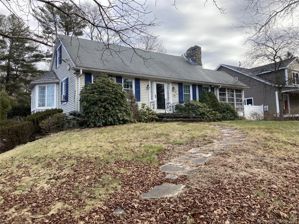 48 Killingly Avenue Putnam, CT 06260 - Photo 1 of 1 a front view of a house with a yard and plants