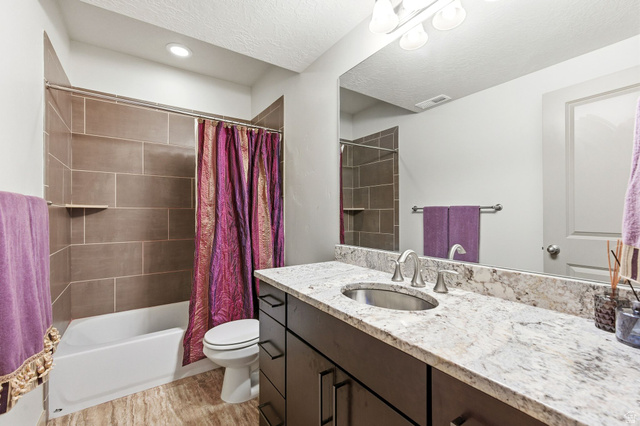 987 East Deer Arch Lane Draper, UT 84020 - Photo 40 of 46 Downstairs hall bathroom, featuring combined tub and shower