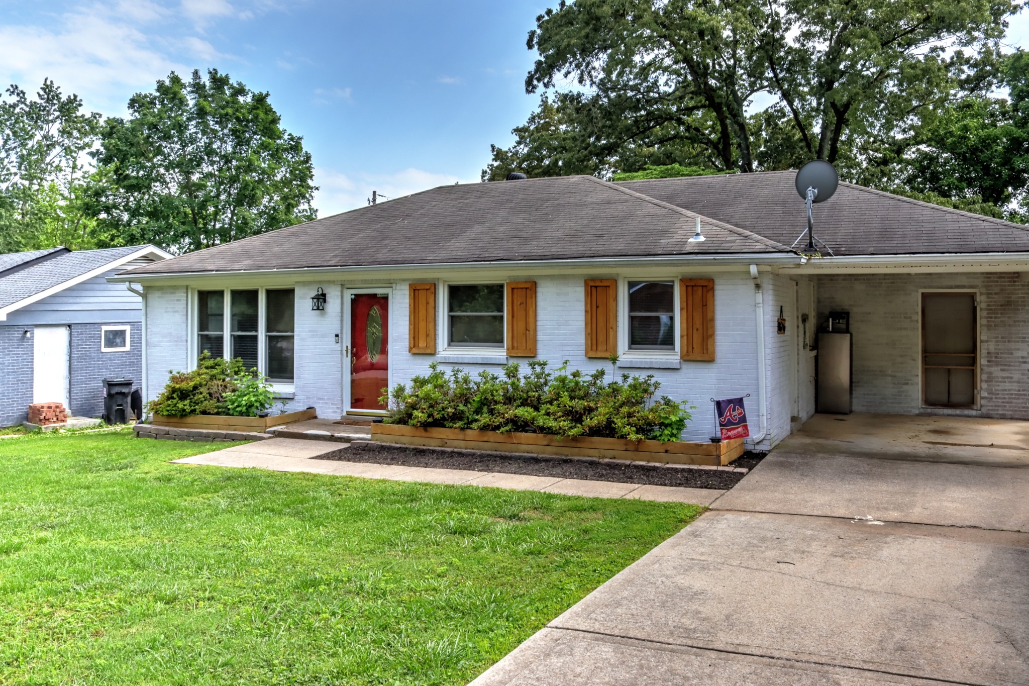 2002 Post Road Clarksville, TN 37043 - Photo 1 of 17 a front view of a house with a yard