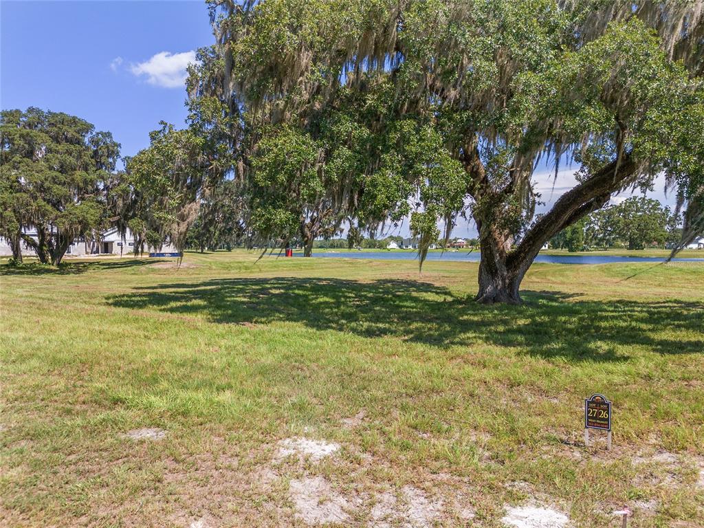 27 Southwest 138th Loop Dunnellon, FL 34432 - Photo 8 of 27 a view of a lake with a big yard