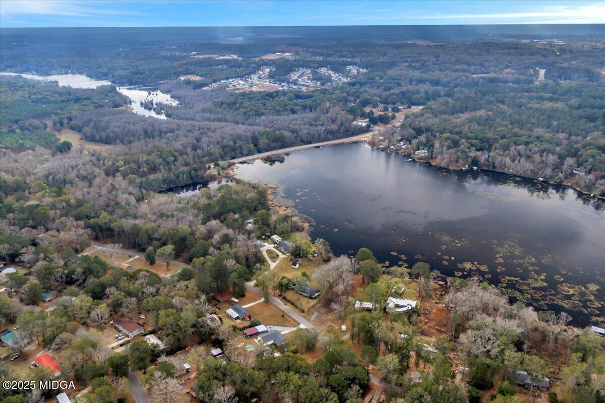 304 North Lake Drive Perry, GA 31069 - Photo 25 of 27 a view of a lake in middle of forest