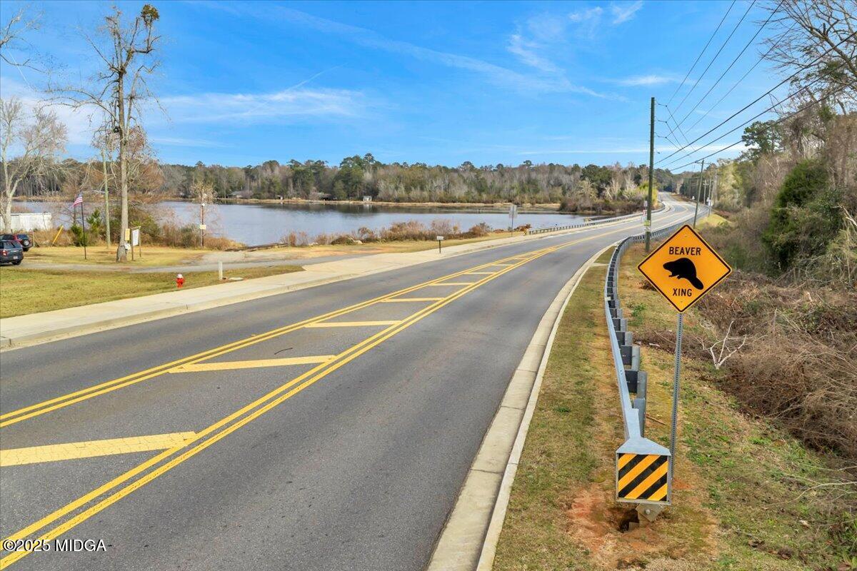 304 North Lake Drive Perry, GA 31069 - Photo 26 of 27 a view of a swimming pool with a lake view