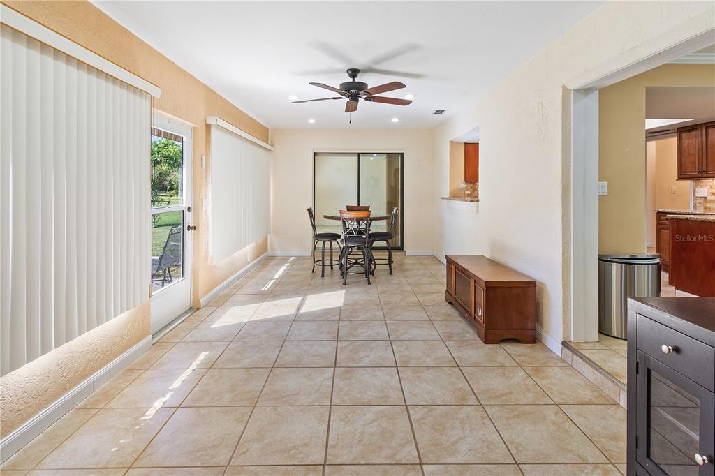 731 Canberra Road Winter Haven, FL 33884 - Photo 14 of 51 a view of a livingroom with furniture and window