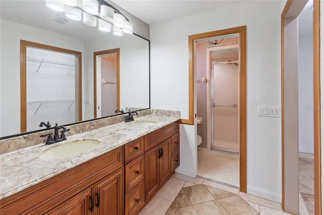 a view of bathroom with a toilet and a shower