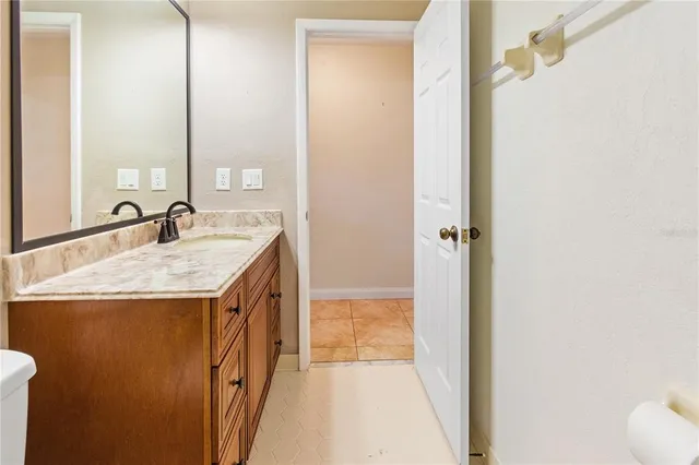 a house view with a sitting space and garden