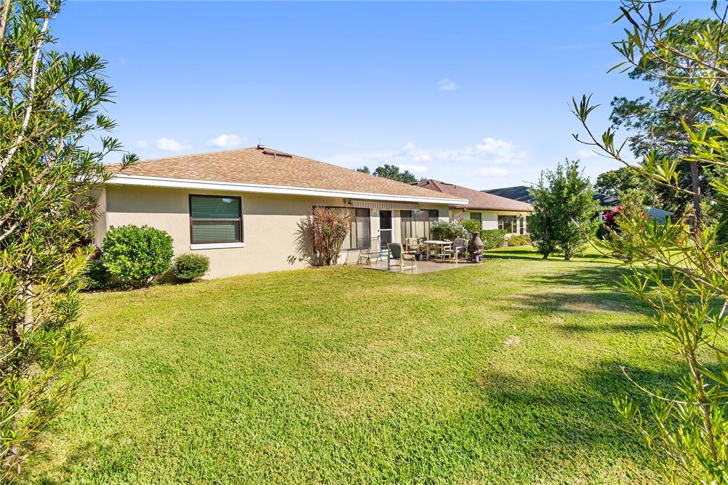 731 Canberra Road Winter Haven, FL 33884 - Photo 28 of 51 a front view of a house with a yard