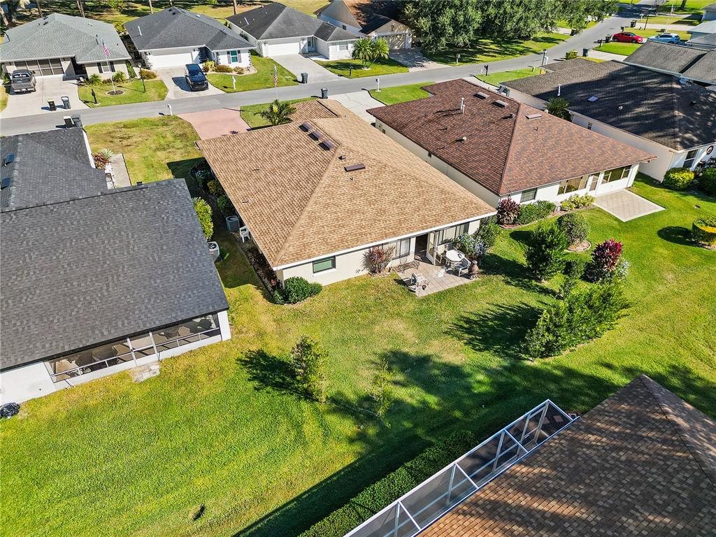 731 Canberra Road Winter Haven, FL 33884 - Photo 35 of 51 an aerial view of a pool yard and mountain view in back