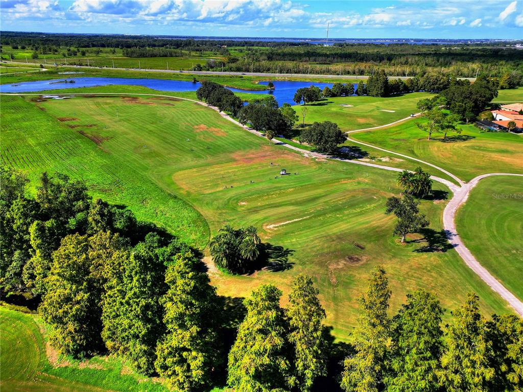 731 Canberra Road Winter Haven, FL 33884 - Photo 40 of 51 a view of a big room with an outdoor space and seating
