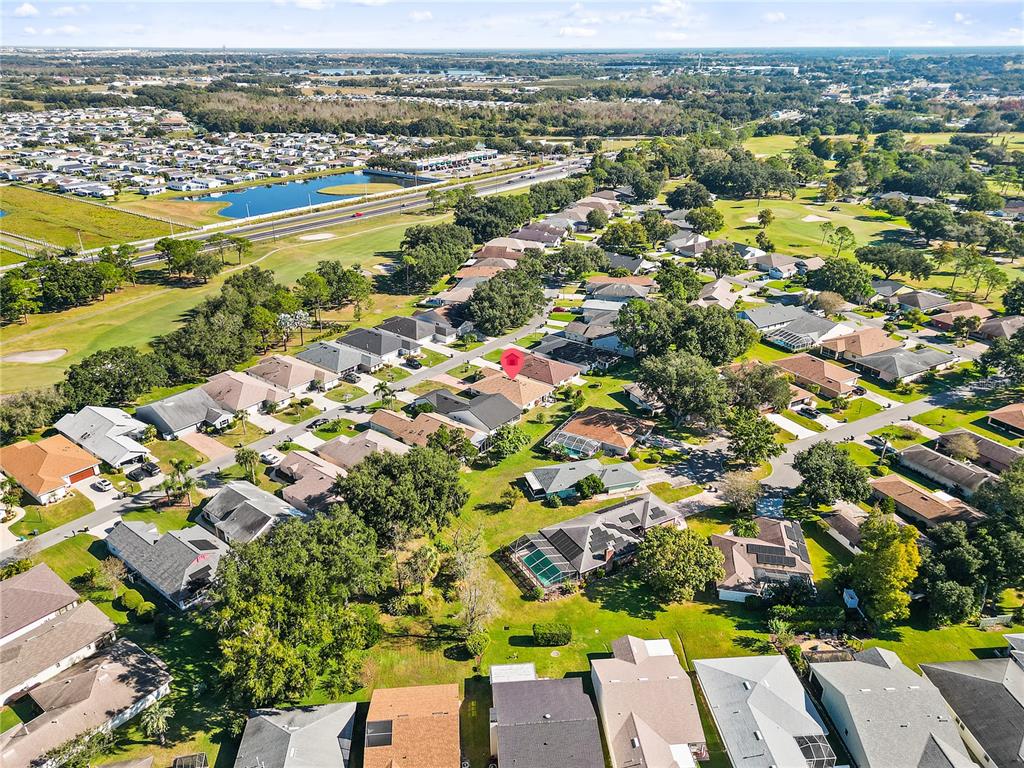 731 Canberra Road Winter Haven, FL 33884 - Photo 47 of 51 an aerial view of residential houses with outdoor space