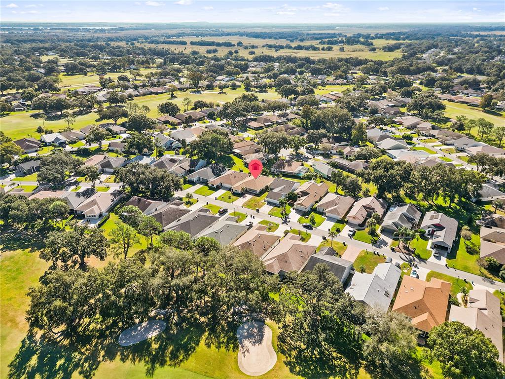 731 Canberra Road Winter Haven, FL 33884 - Photo 48 of 51 an aerial view of residential houses with outdoor space
