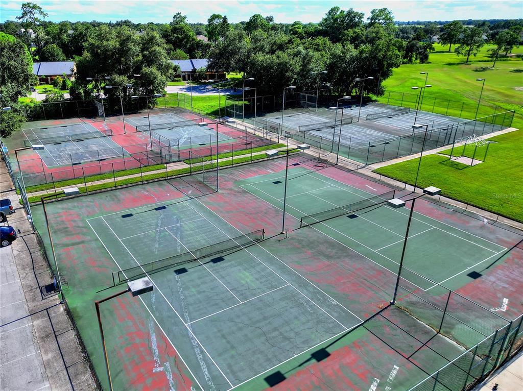 731 Canberra Road Winter Haven, FL 33884 - Photo 6 of 51 an outdoor space with chairs