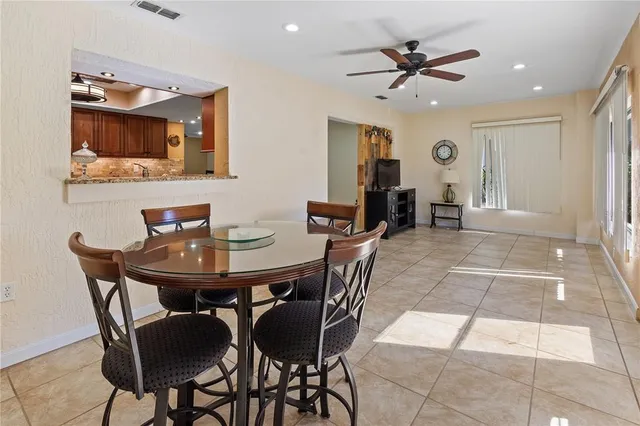 a view of a dining room with furniture