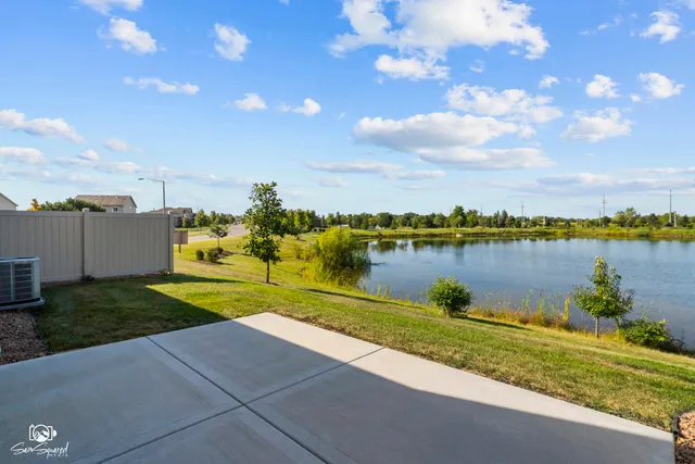 a view of a lake with a big yard
