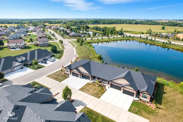 a view of a terrace with chairs and a table