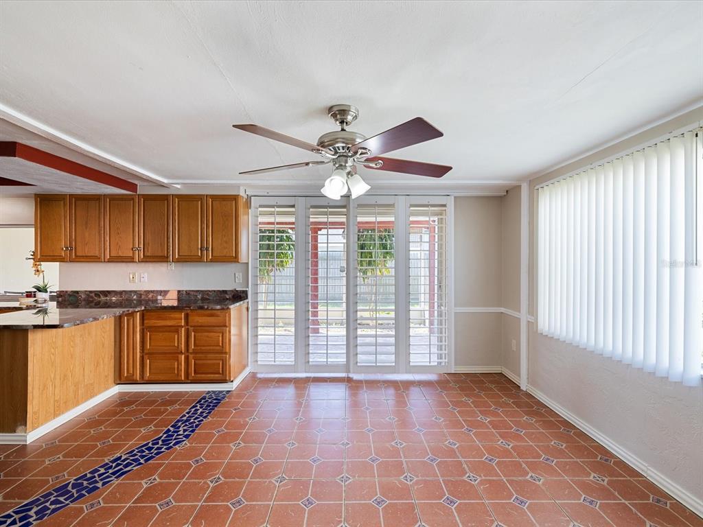 3730 Sail Drive New Port Richey, FL 34652 - Photo 14 of 50 a view of a kitchen with a sink and a window