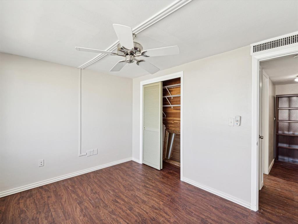 3730 Sail Drive New Port Richey, FL 34652 - Photo 22 of 50 wooden floor in an empty room with a window