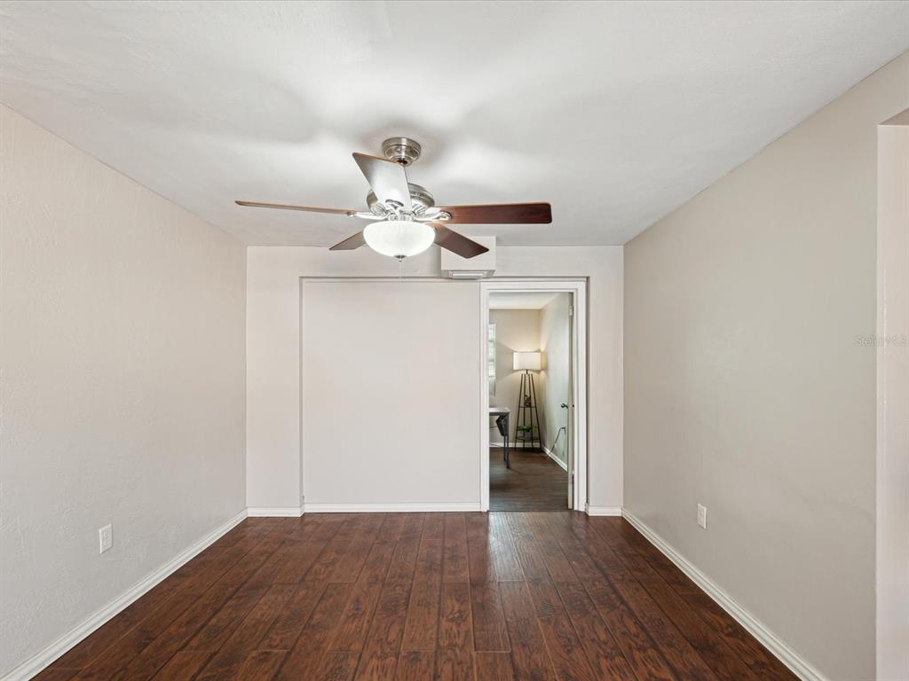 3730 Sail Drive New Port Richey, FL 34652 - Photo 25 of 50 a view of empty room with wooden floor