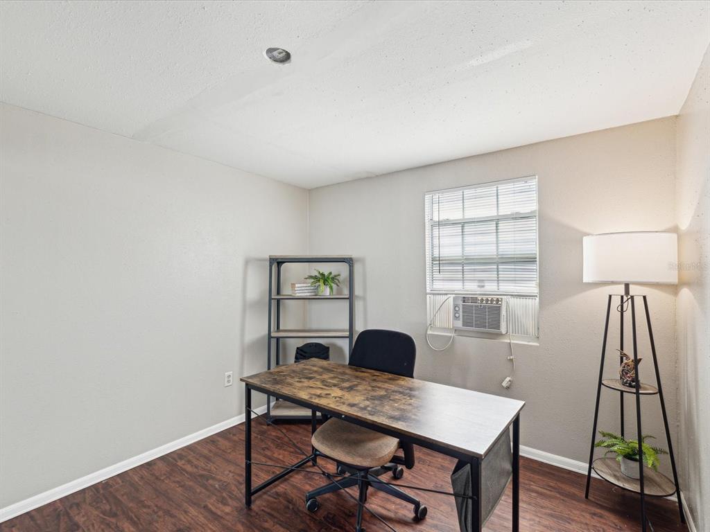 3730 Sail Drive New Port Richey, FL 34652 - Photo 28 of 50 a view of a workspace with furniture and a window