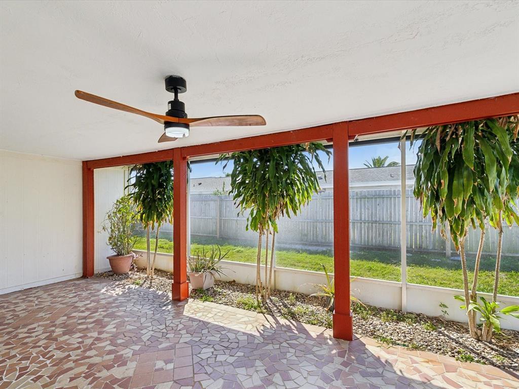 3730 Sail Drive New Port Richey, FL 34652 - Photo 30 of 50 a view of a porch with a backyard