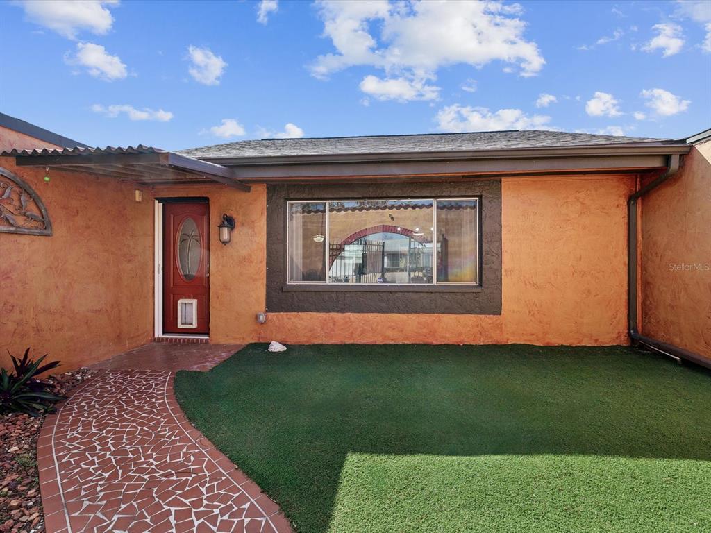 3730 Sail Drive New Port Richey, FL 34652 - Photo 3 of 50 a view of outdoor space yard and balcony