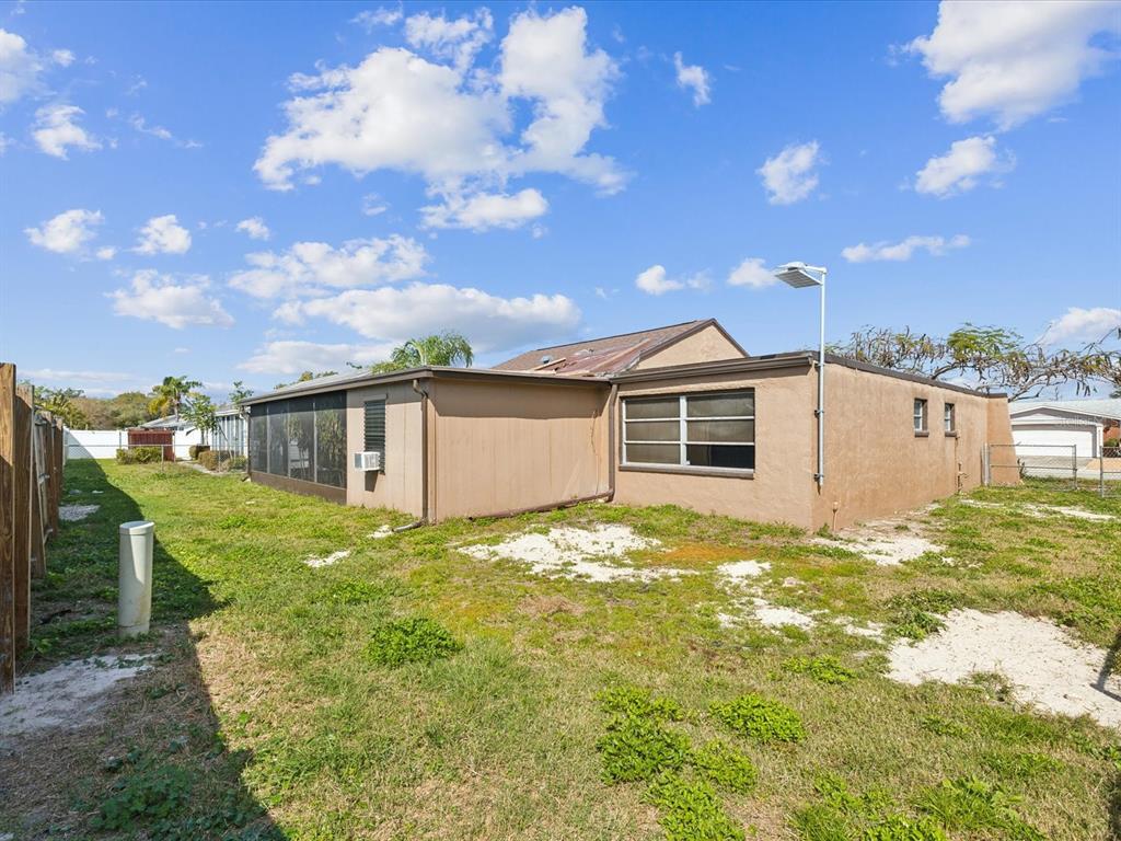 3730 Sail Drive New Port Richey, FL 34652 - Photo 38 of 50 a front view of a house with garden