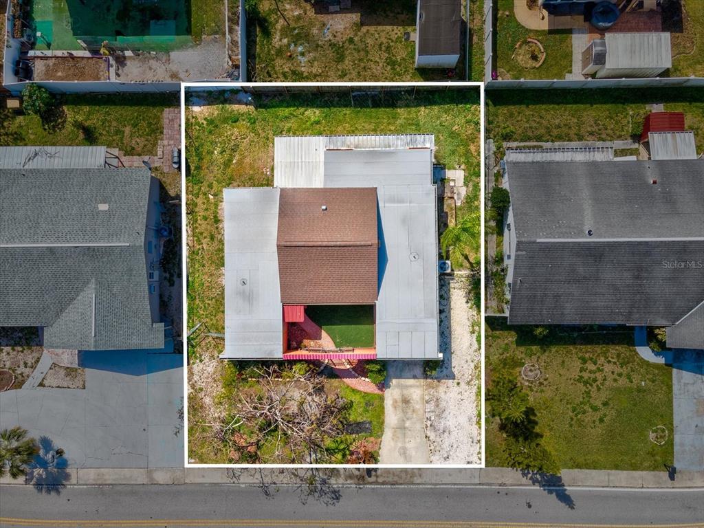3730 Sail Drive New Port Richey, FL 34652 - Photo 41 of 50 an aerial view of a house with a yard