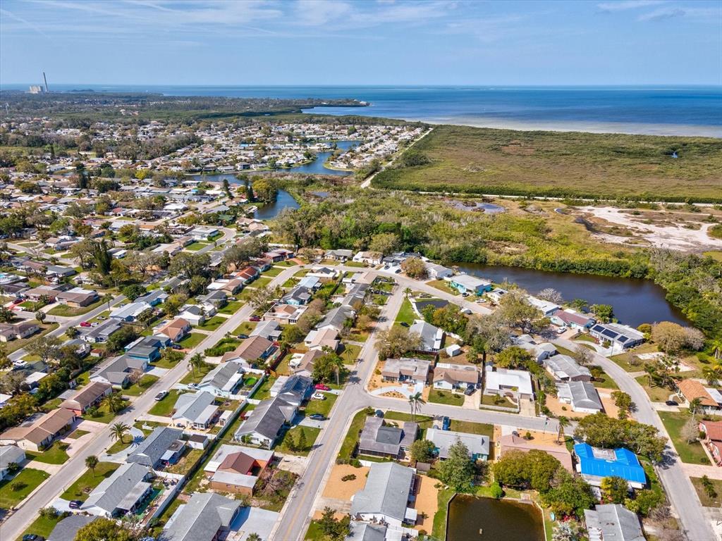 3730 Sail Drive New Port Richey, FL 34652 - Photo 50 of 50 an aerial view of residential building and lake