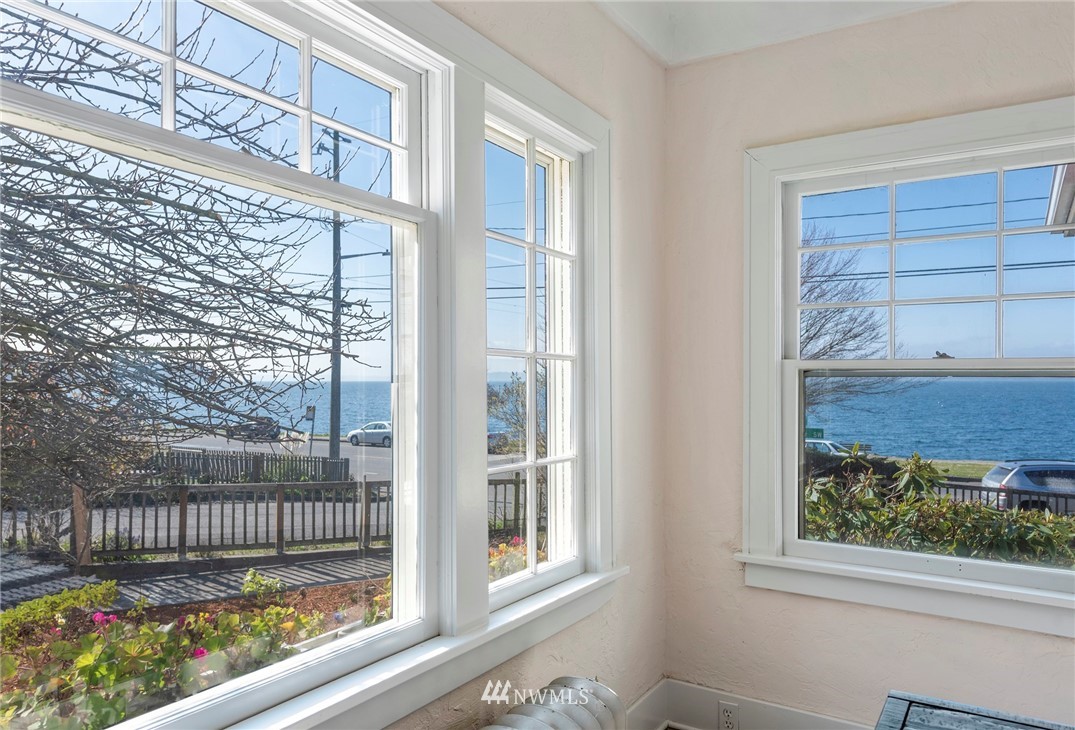 a view of a porch with a floor to ceiling window