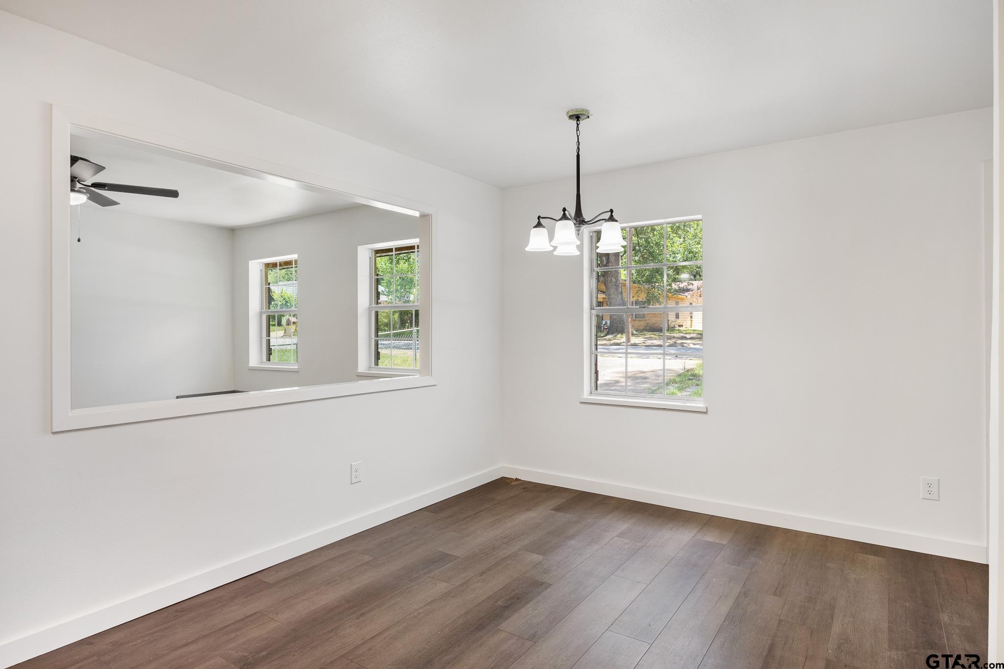 1538 North Hill Road Tyler, TX 75702 - Photo 12 of 29 a view of an empty room with windows