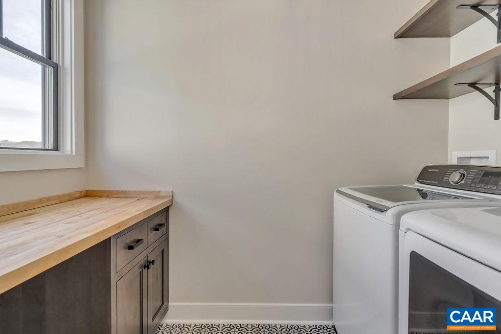 5797 Advance Mills Road Ruckersville, VA 22968 - Photo 23 of 50 a utility room with dryer and washer