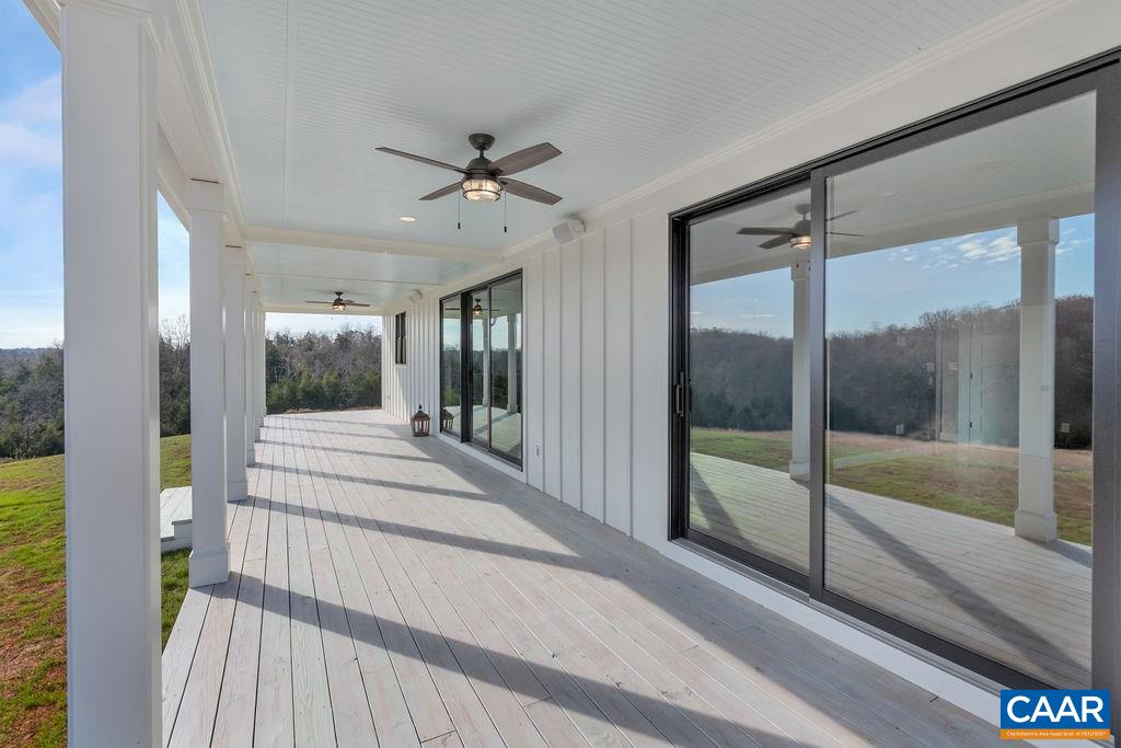 5797 Advance Mills Road Ruckersville, VA 22968 - Photo 46 of 50 a view of a hallway with a glass door and shower