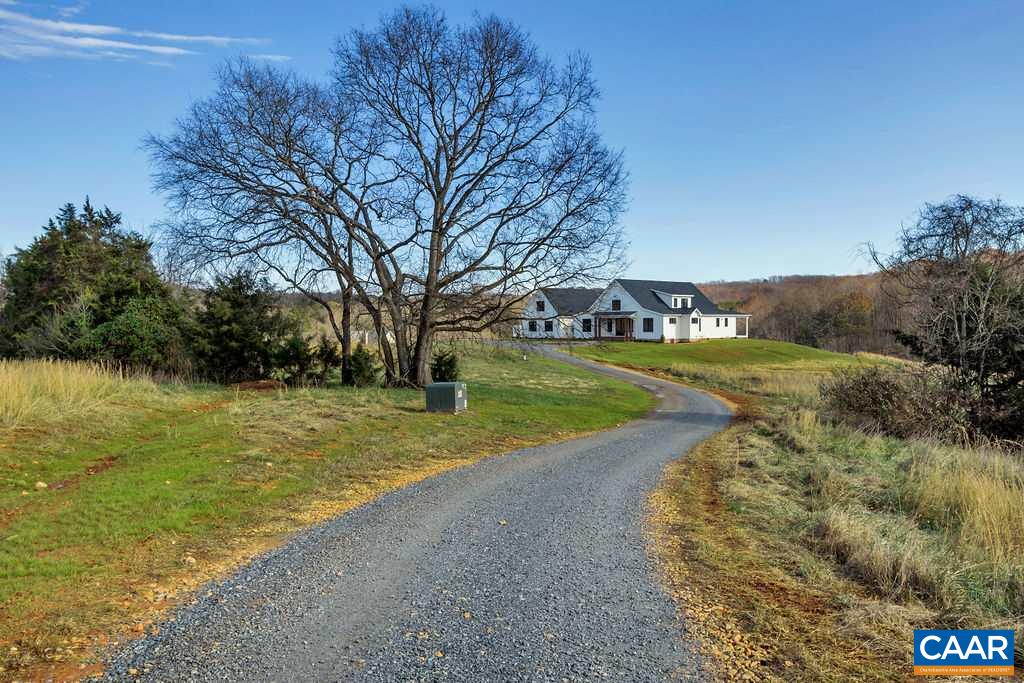 5797 Advance Mills Road Ruckersville, VA 22968 - Photo 49 of 50 a view of a house with yard and lake view