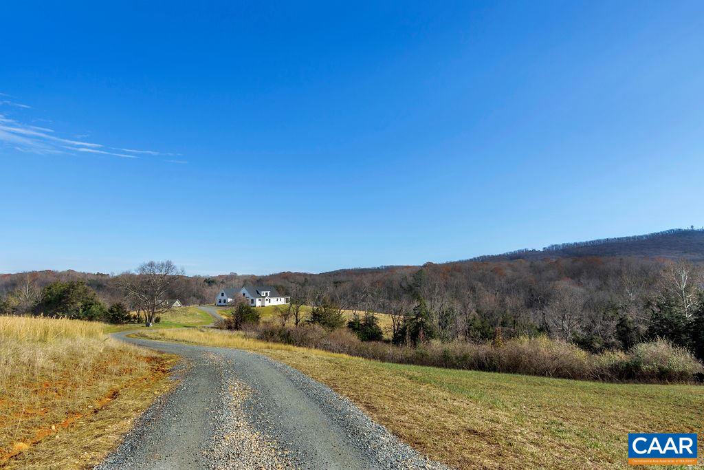 5797 Advance Mills Road Ruckersville, VA 22968 - Photo 50 of 50 a view of a town with mountains in the background
