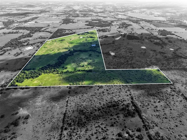 a view of swimming pool with a yard
