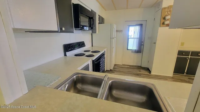 a view of kitchen and living room