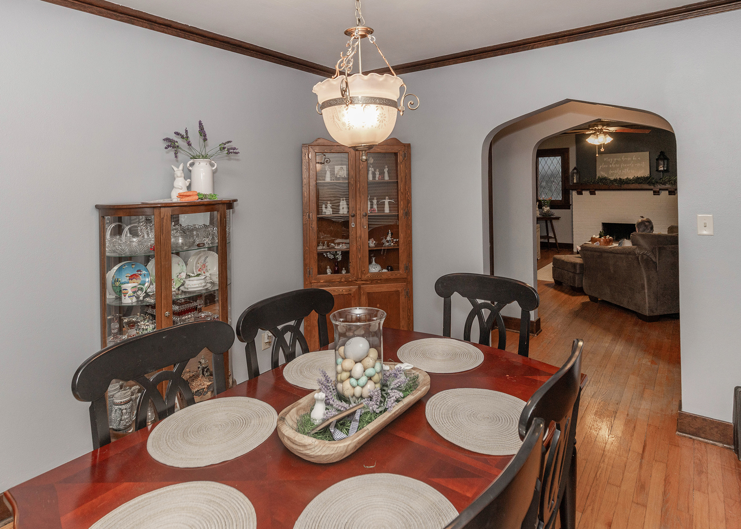 1125 17th Avenue Moline, IL 61265 - Photo 16 of 33 a dining room with furniture a chandelier and wooden floor
