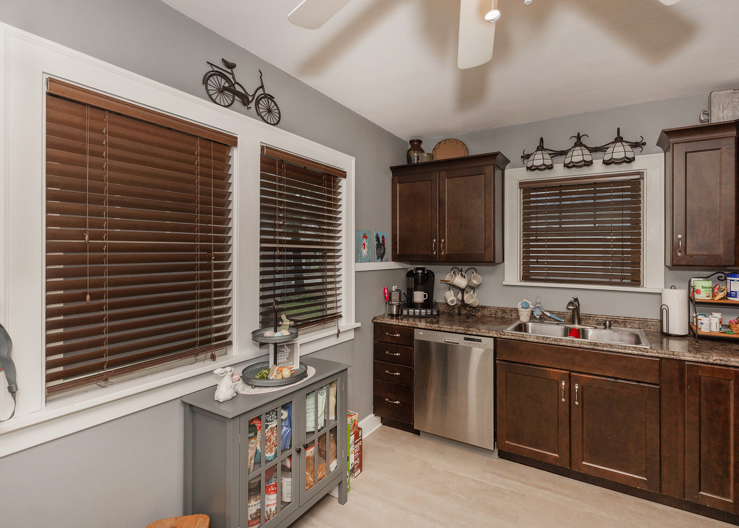 1125 17th Avenue Moline, IL 61265 - Photo 19 of 33 a kitchen with stainless steel appliances granite countertop a sink stove and cabinets