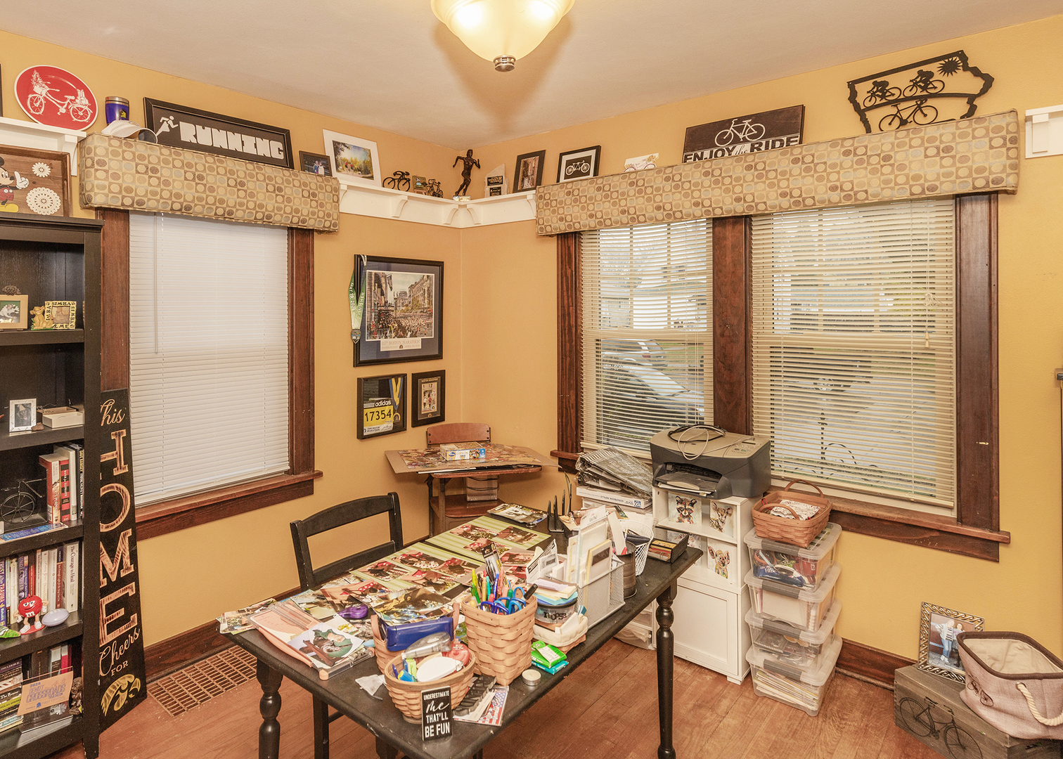 1125 17th Avenue Moline, IL 61265 - Photo 24 of 33 a living room with a large window and a table