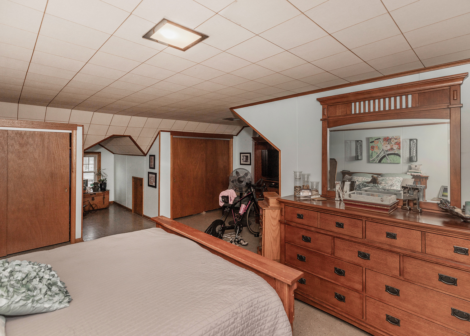 1125 17th Avenue Moline, IL 61265 - Photo 29 of 33 a bedroom with a bed and a dresser