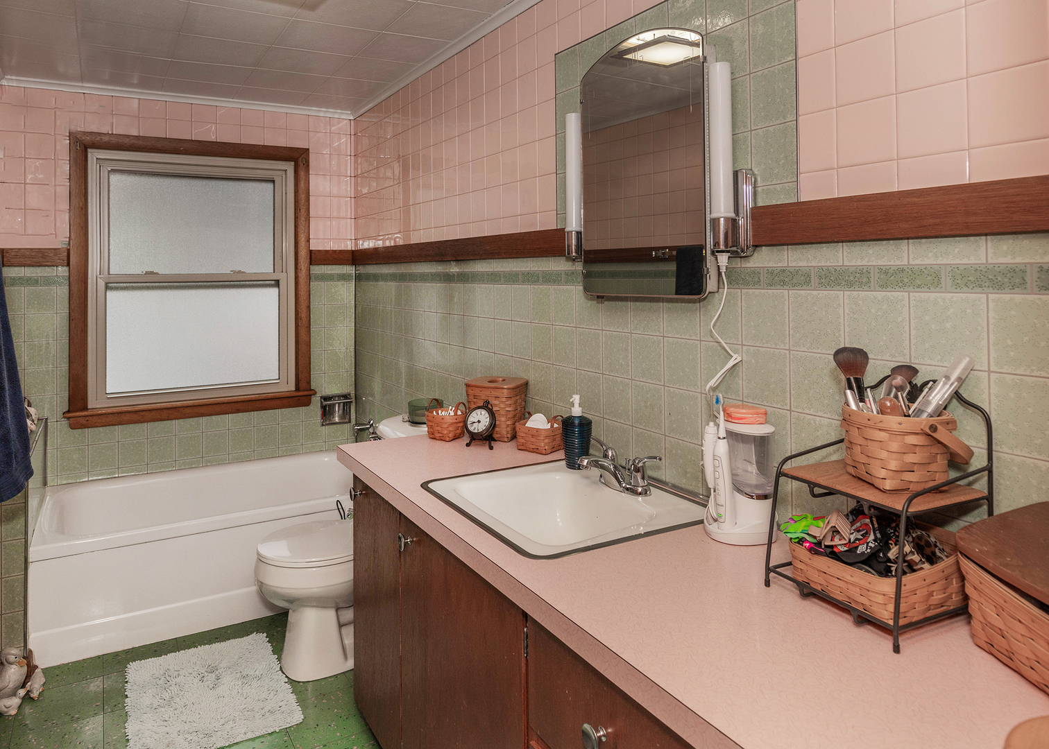 1125 17th Avenue Moline, IL 61265 - Photo 30 of 33 a bathroom with a sink toilet and shower