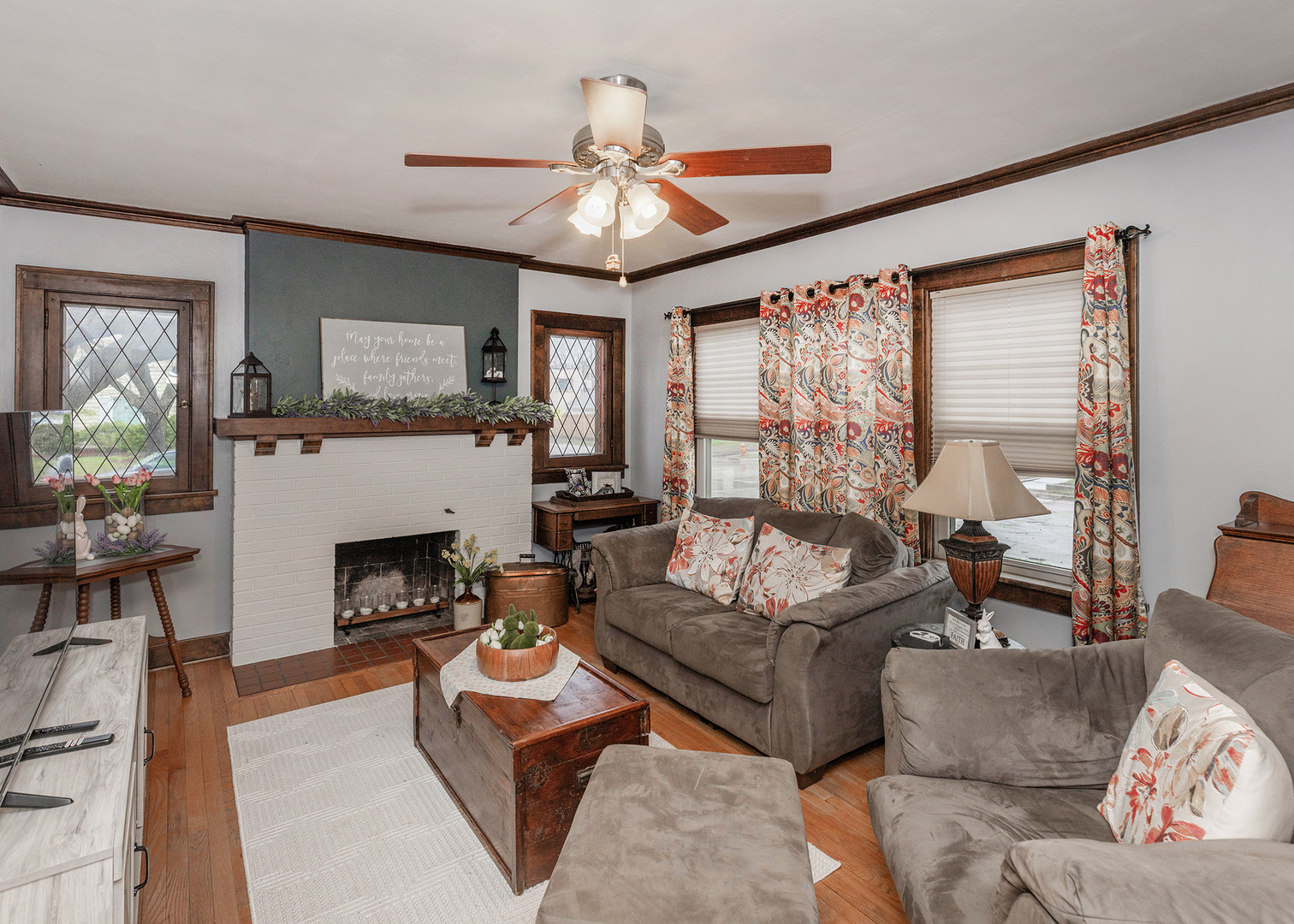 1125 17th Avenue Moline, IL 61265 - Photo 7 of 33 a living room with furniture and a fireplace