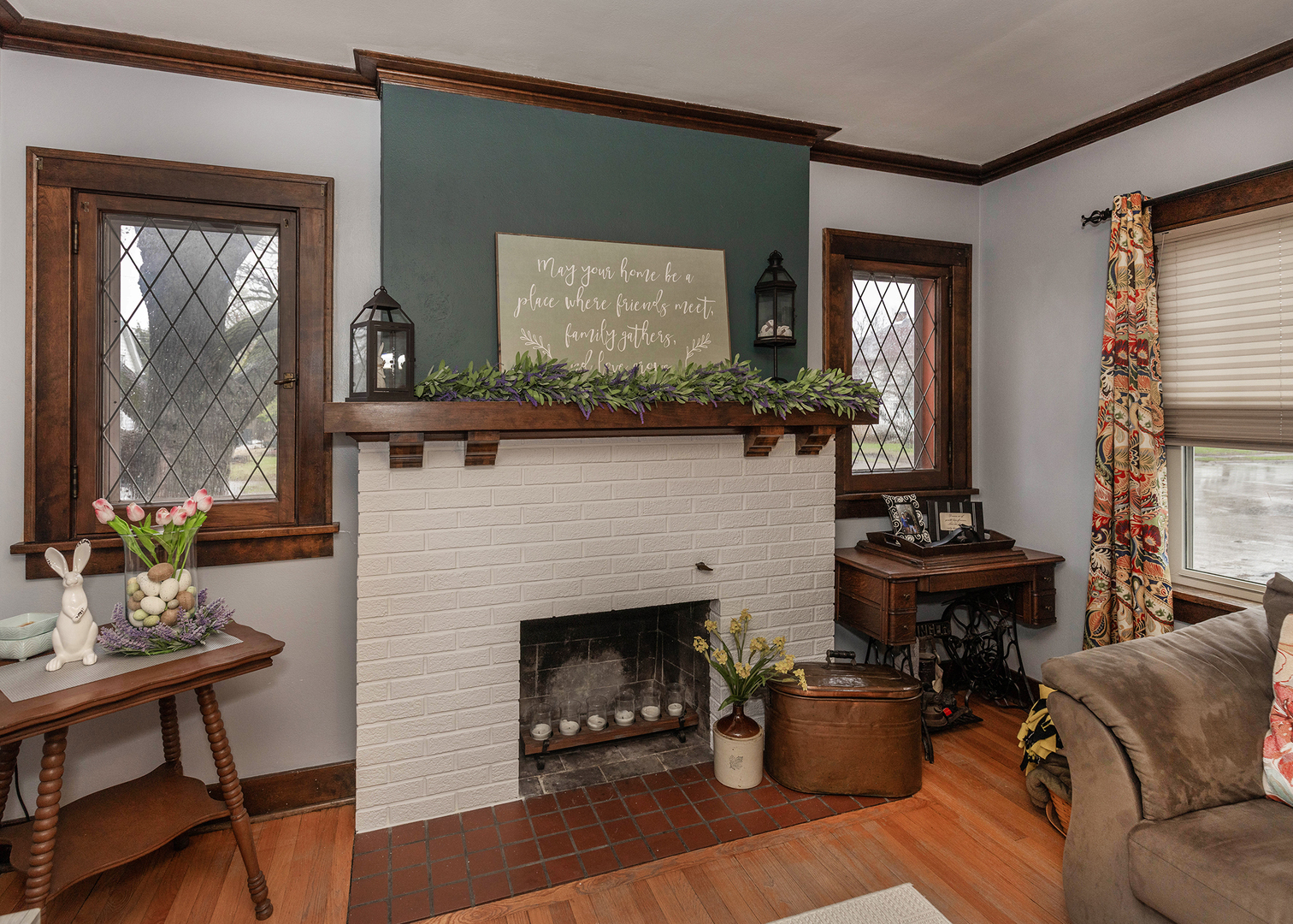 1125 17th Avenue Moline, IL 61265 - Photo 8 of 33 a living room with furniture a window and a fireplace