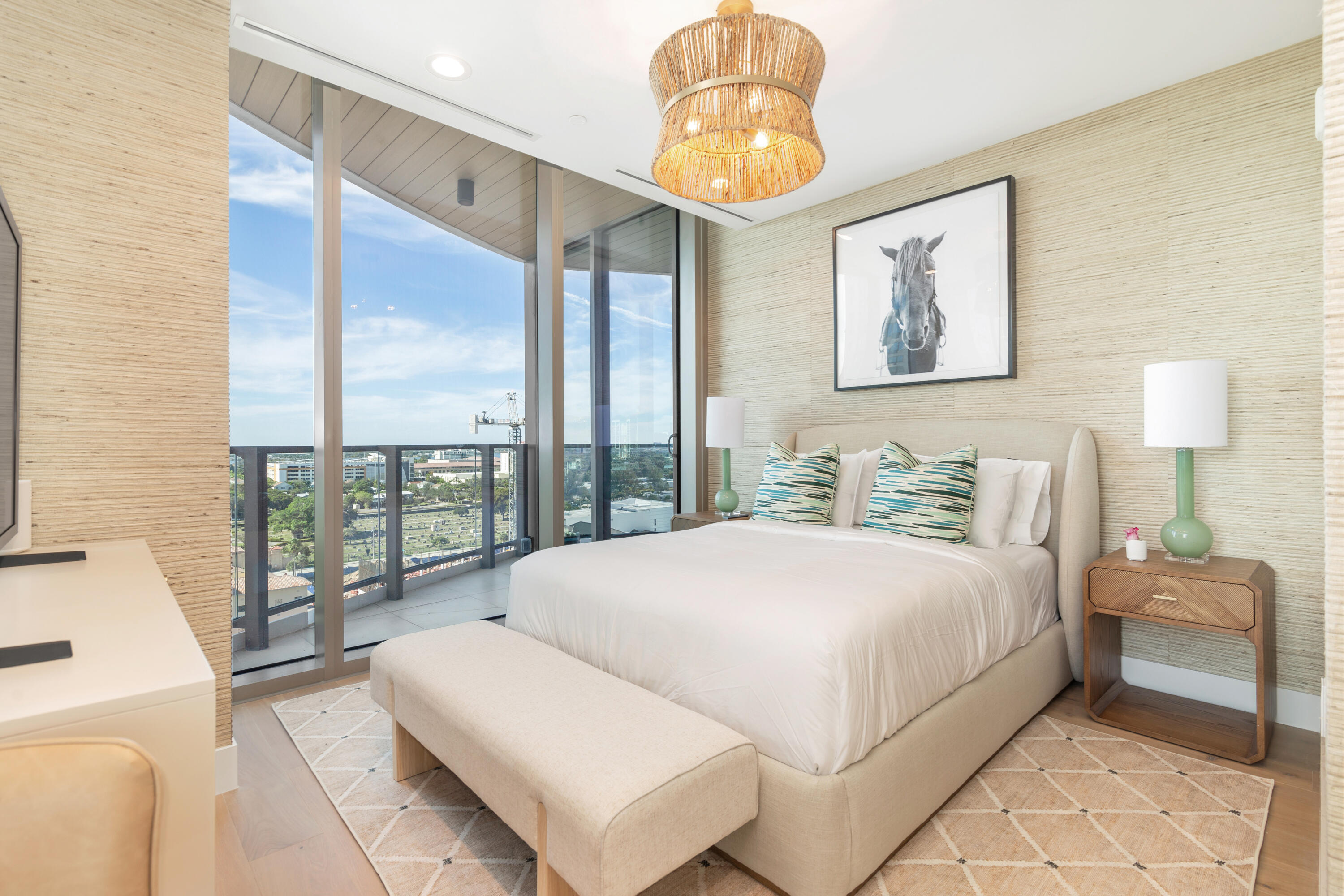 1333 South Flagler Drive, Unit 1202 West Palm Beach, FL 33401 - Photo 21 of 42 a bedroom with a large bed and a large window