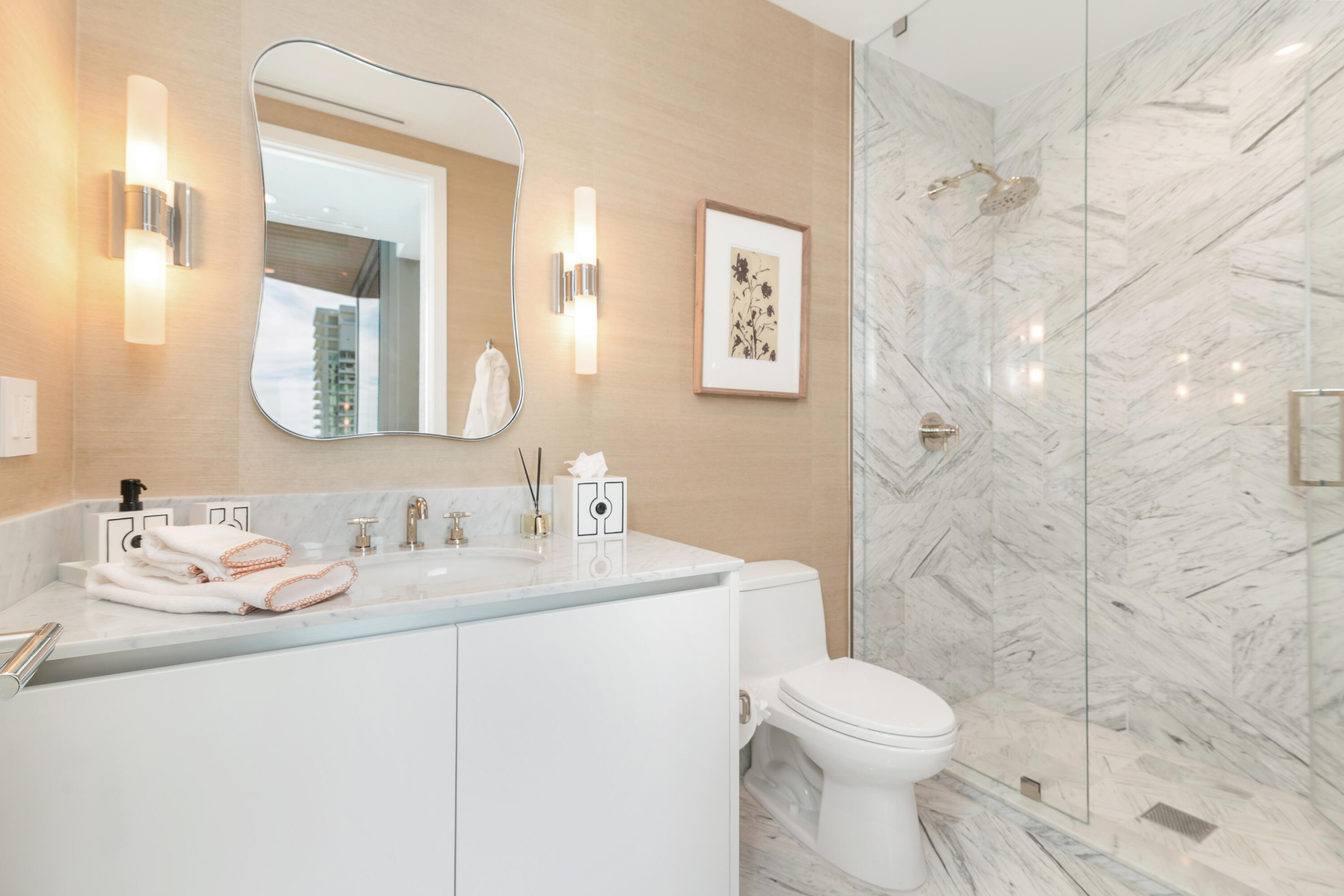 1333 South Flagler Drive, Unit 1202 West Palm Beach, FL 33401 - Photo 22 of 42 a bathroom with a sink a toilet and shower