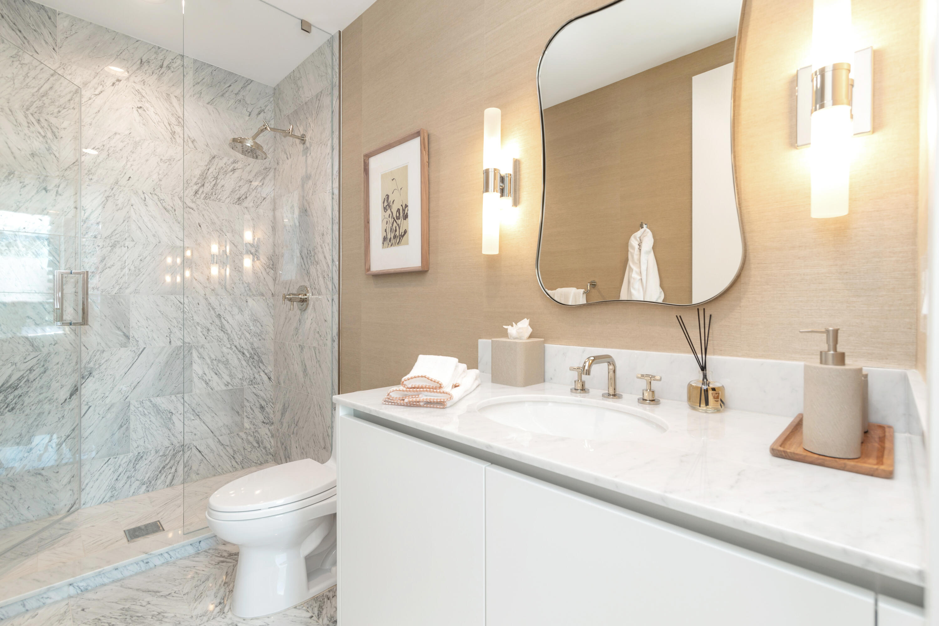 1333 South Flagler Drive, Unit 1202 West Palm Beach, FL 33401 - Photo 24 of 42 a bathroom with a sink vanity mirror and toilet