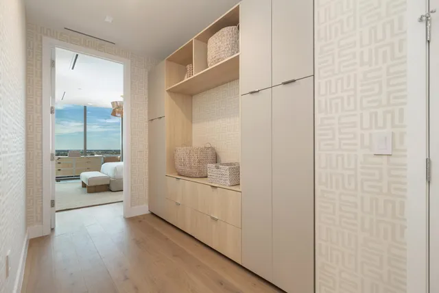 a utility room with sink dryer and washer