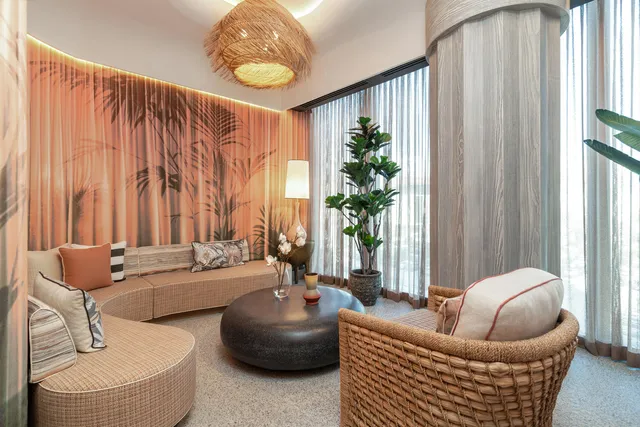 a large room with lots of furniture and a view of dining table chairs