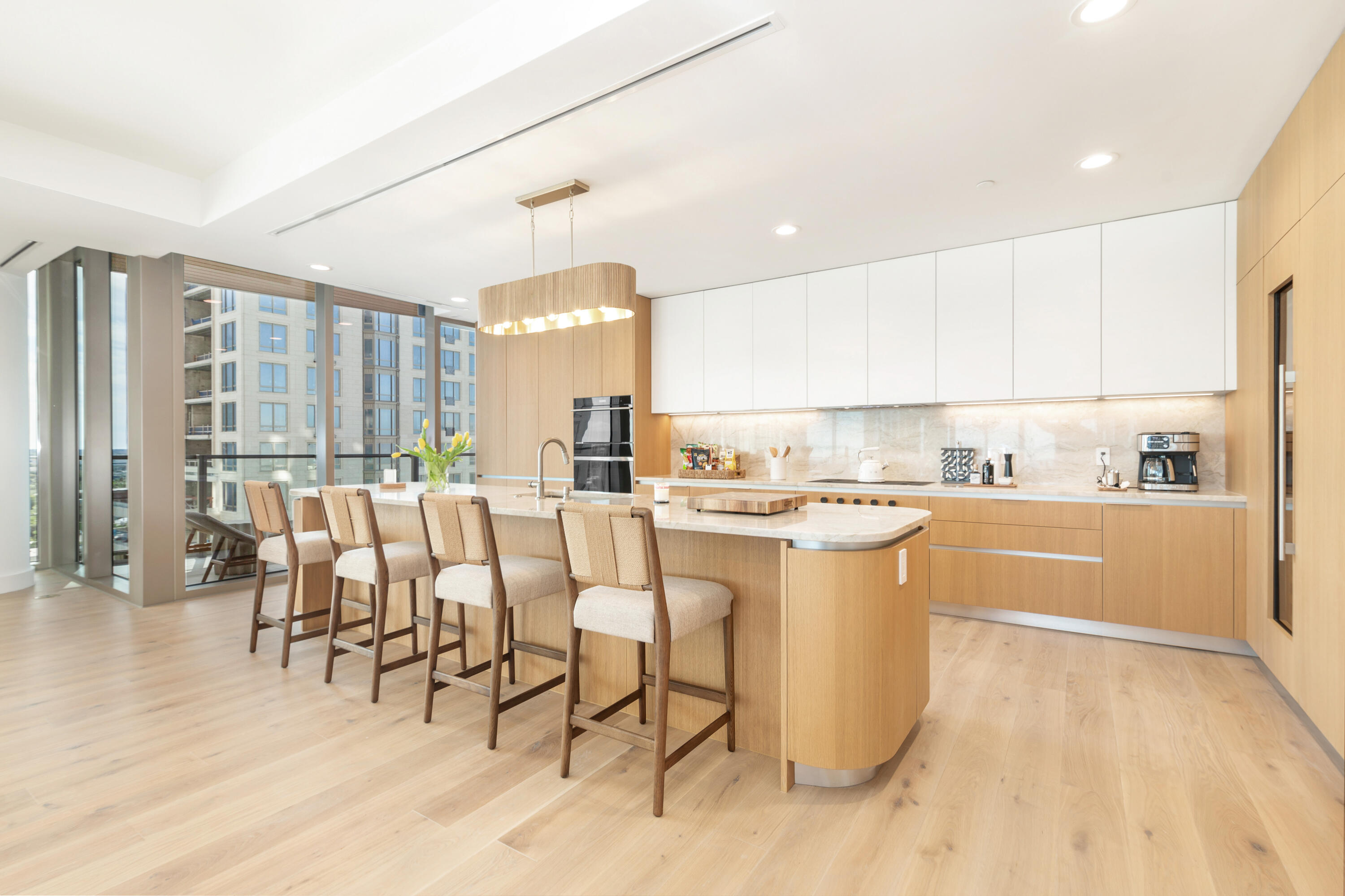 1333 South Flagler Drive, Unit 1202 West Palm Beach, FL 33401 - Photo 4 of 42 a large kitchen with lots of counter space and appliances