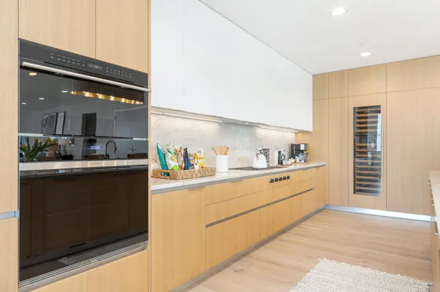 a large kitchen with lots of counter space and appliances